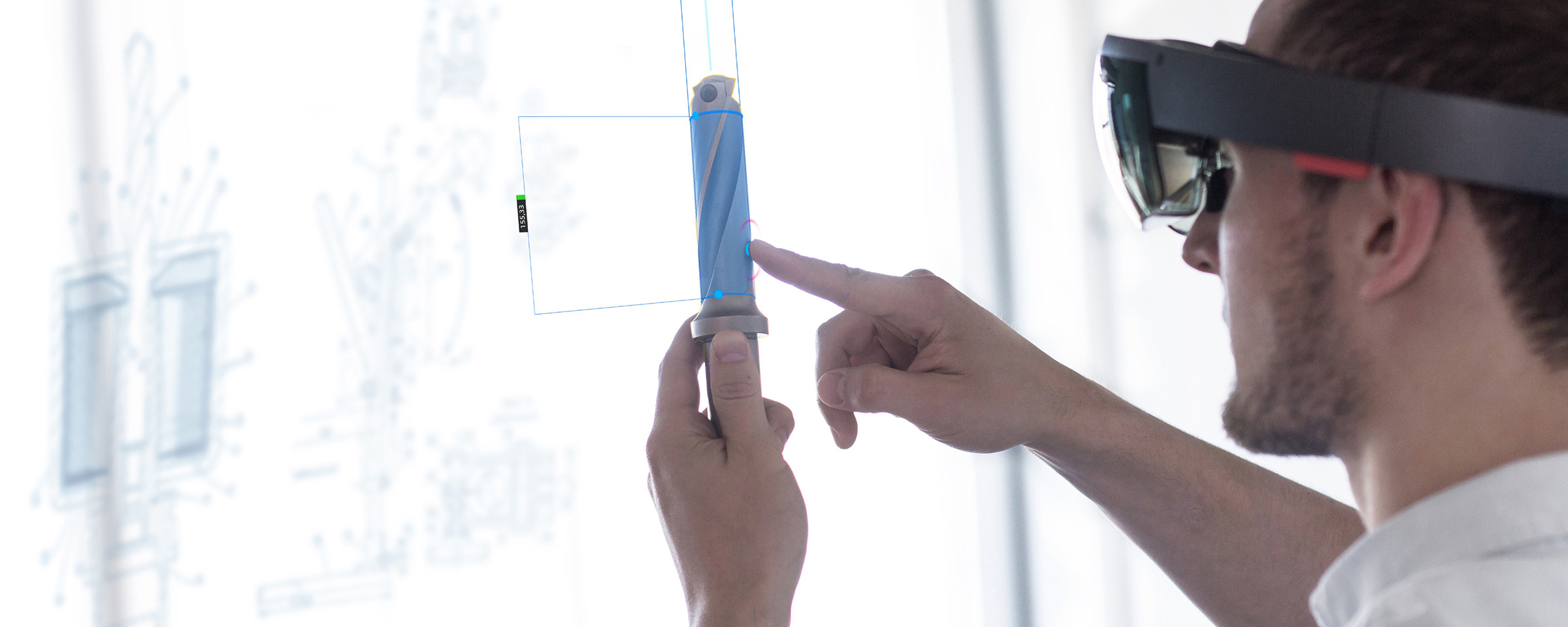 A person receives information about a workpiece through the tool of Augmented Reality